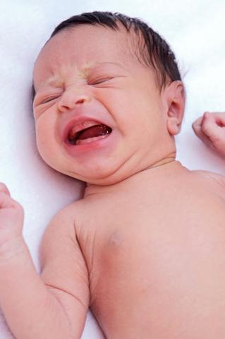 Barn med gastroøsofageal  refluks-sygdom Foto: Colourbox